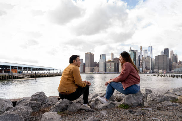 istock Friends talking by the Hudson River in NYC 1489494390