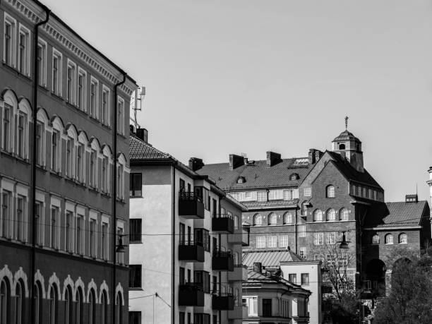 istock Low angle view of buildings against clear sky 1489494725