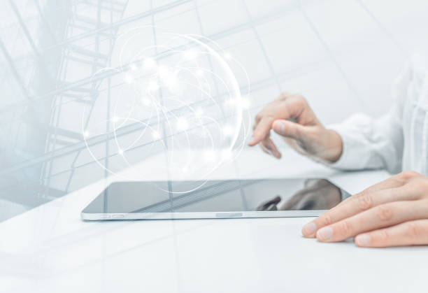 istock Engineer or businesswoman using tablet pc on the internet technology background. 1489498125