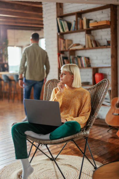 istock Pensive woman working casually at home. 1489506204