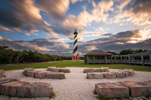 Cape Hatteras Lighthouse in the Outer Banks of North Carolina, USA at dusk.