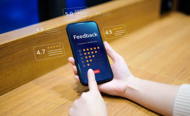 istock User give rating to service excellent experience on mobile phone application, Client evaluate quality of service reputation ranking of business. Customer review satisfaction feedback survey concept. 1489511521
