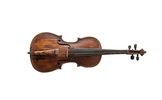 Antique violin isolated on a white background.