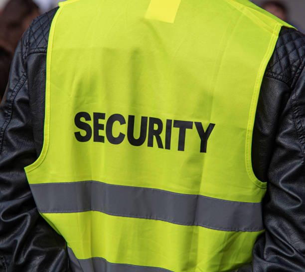 istock Close-up of a yellow guard's vest. 1489514772