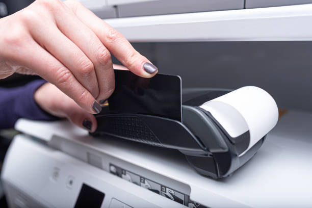 istock Bank terminal and payment card. 1489514865