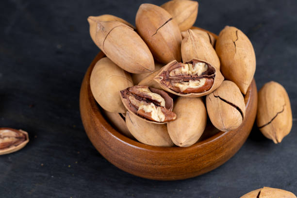 istock Unpeeled crunchy pecans close up 1489515558