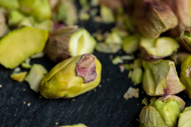 istock Crispy delicious pistachios with salt on the table 1489516747