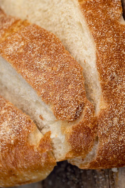 istock A cut loaf of round-shaped wheat bread 1489516974