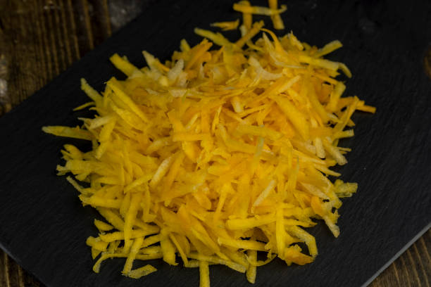 istock Sliced into thin slices of bright yellow carrots in the kitchen 1489517289