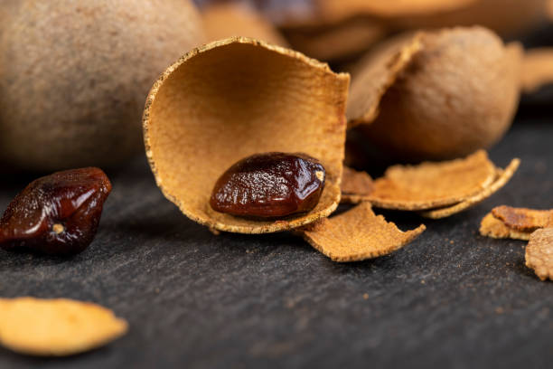 istock the shell of the peeled tamarind fruit on the table 1489517346