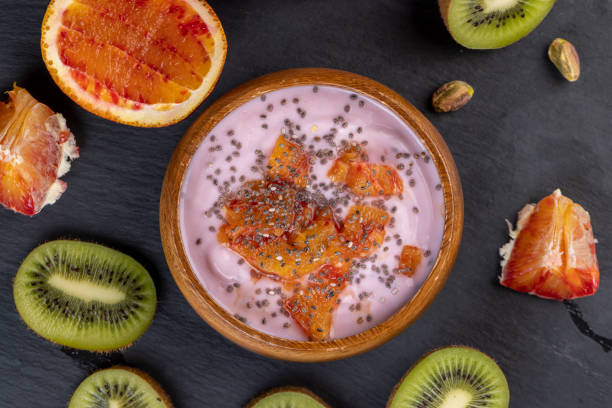 istock fresh yogurt with berries and fruits with red oranges 1489517508