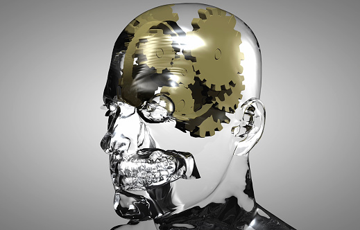 A human bust made of glass that starts to work by turning the wheel system in his brain and generating ideas. / You can see the animation movie of this image from my iStock video portfolio. Video number: 1489411911