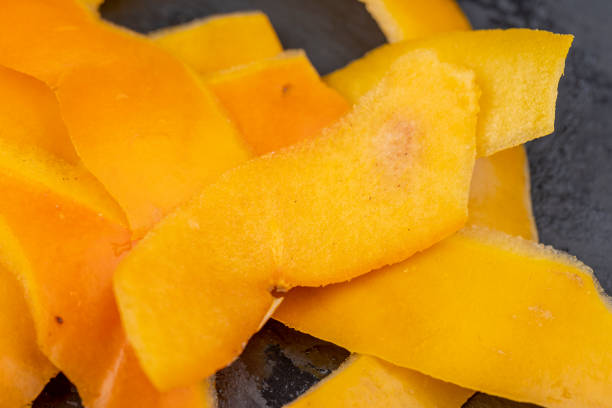istock peeled with a thin layer of ripe persimmon peel 1489517704