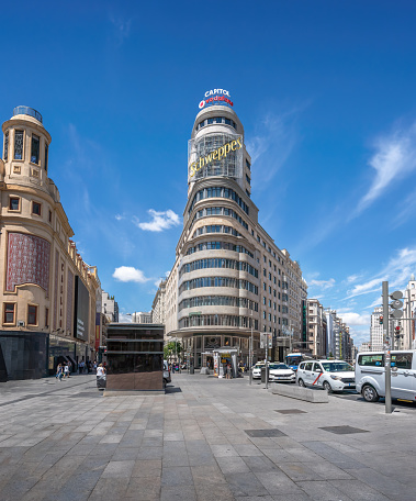 Madrid, Spain - Jun 19, 2019: Edificio Capitol (or Carrion) Building at Gran Via Street and Plaza Callao Square - Madrid, Spain