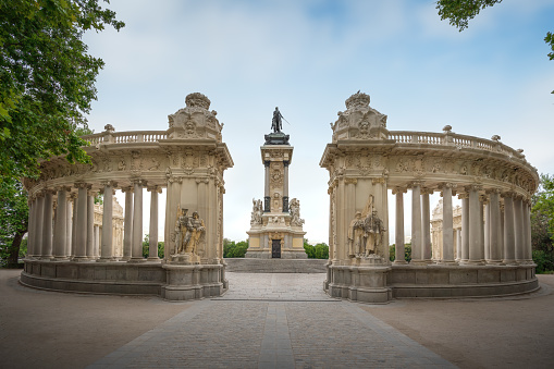 Madrid, Spain - Mar 10, 2019: Monument to Alfonso XII Colonnade at Retiro Park - Madrid, Spain