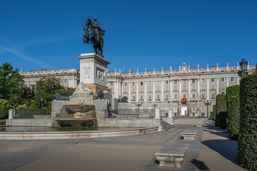Madrid, Spain - Jun 19, 2019: Plaza de Oriente Square with Monument to Philip IV (Felipe IV) and Royal Palace of Madrid - Madrid, Spain