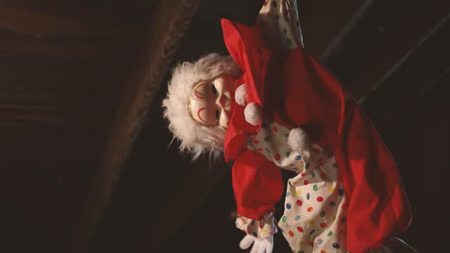Creepy Clown Hanging from Attic Rafters