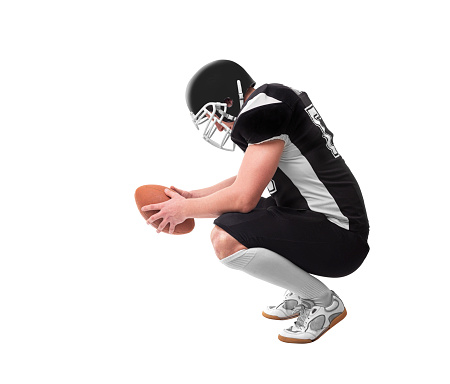 American football player with ball isolated on white background.