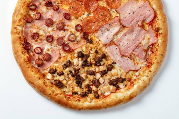 istock Delicious italian pizzas served on a white background 1489526962