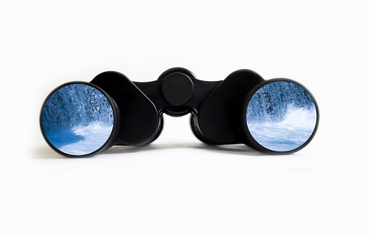 binoculars reflection sea on white background