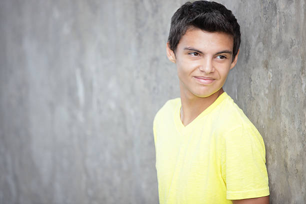 istock Teenager leaning on a concrete wall 148953462