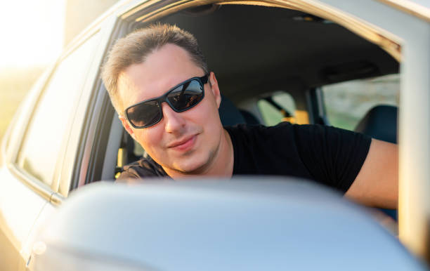 istock The man is driving a car. 1489535000