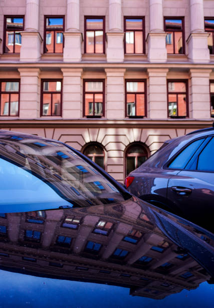 istock cars parked in front of a building 1489535342