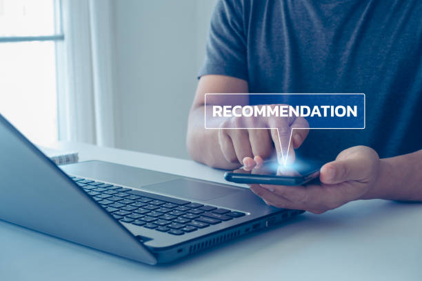 istock Businessman is using smartphone, pressing on virtual screen and selecting Recommendation on online application. 1489539044