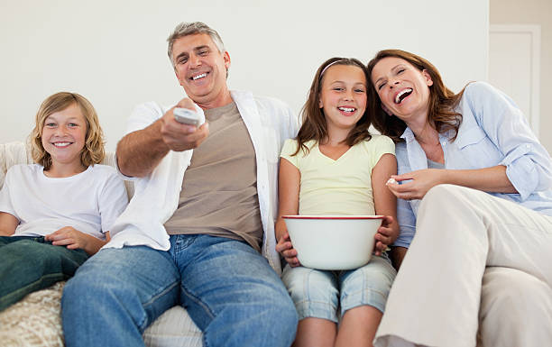istock Family on the sofa watching tv 148955113