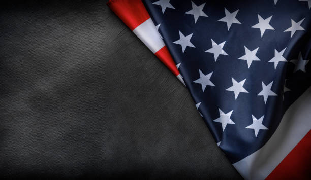 istock USA flag on a dark background. 1489553479
