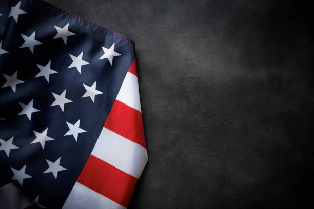 istock USA flag on a dark background. 1489553485