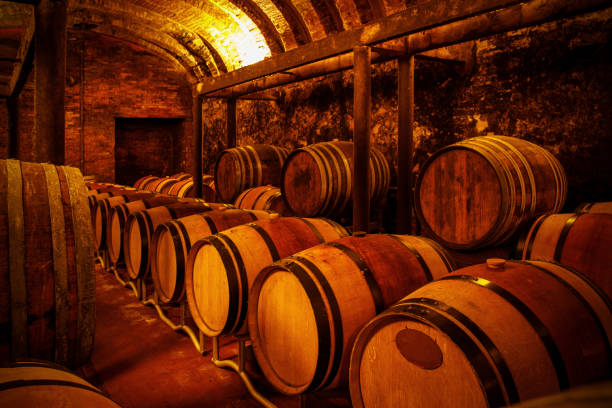 istock Rustic wine storage room with wooden barrels. 1489554389