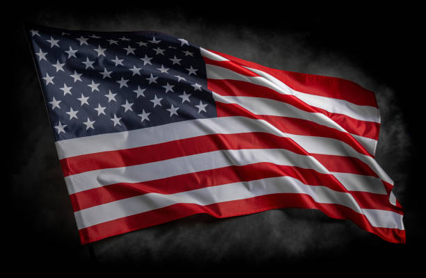 istock American flag on dark background 1489557163
