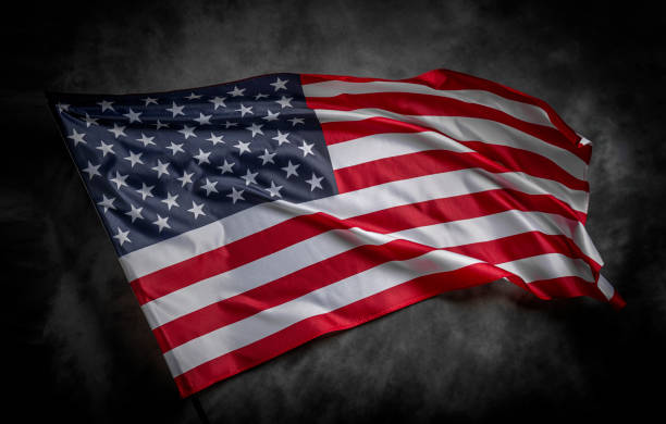 istock American flag on dark background 1489557176