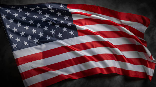 istock American flag on dark background 1489557212