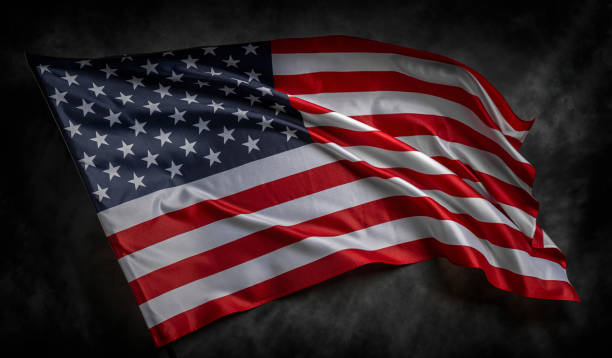 istock American flag on dark background 1489557218