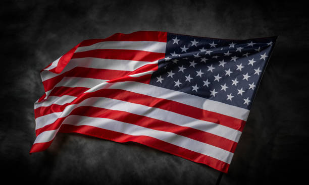 istock American flag on dark background 1489557220