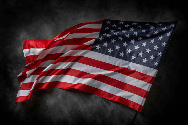 istock American flag on dark background 1489557229
