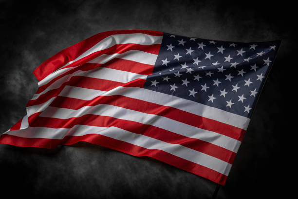 istock American flag on dark background 1489557269