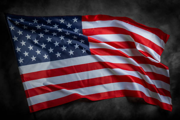 istock American flag on dark background 1489557283