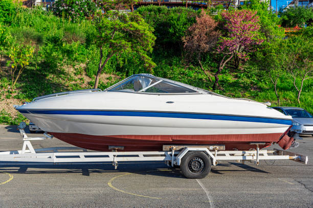 istock A small yacht on a car trailer. 1489558775