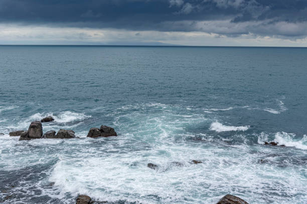 istock Waves on the sea dispersed by the wind on a cloudy day. 1489558896