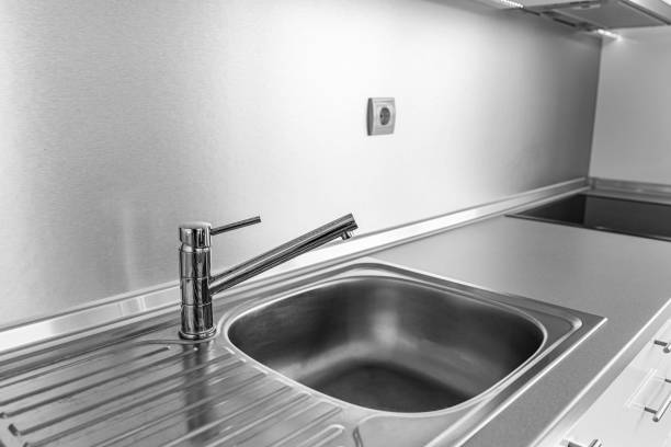 istock Kitchen sink and water tap. 1489558927