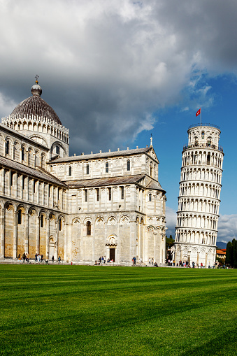 Dramatic clouds over the famous Pisa Tower. One of the most popular tourist places in the world