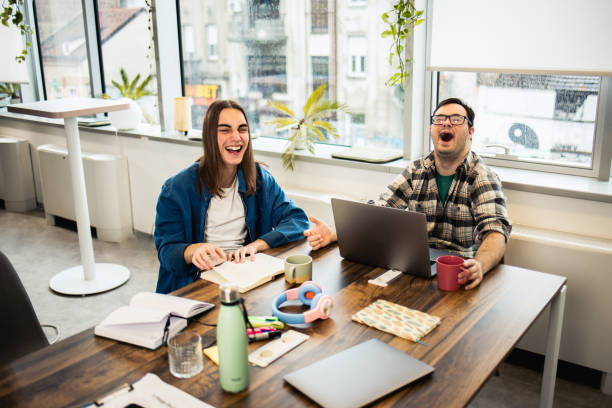 istock Young man presenting a business project to his diverse business team 1489567406