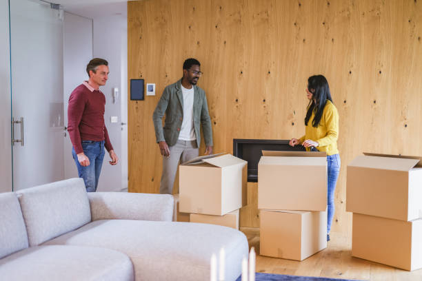 istock A Diverse Group Of People Talking And Moving Big Boxes In A New Apartment 1489567821