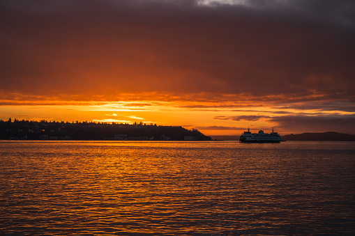 Sunset over Elliott Bay with a Ferry crossing by.