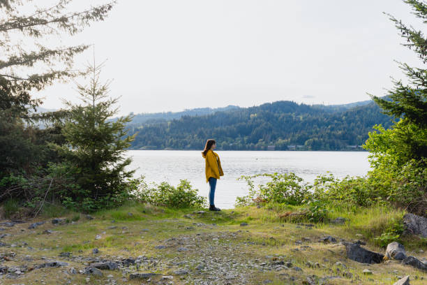 istock Woman In Nature With Yellow Jacket 1489575702