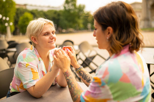 istock Lovely Lgbtq couple holding hands 1489577010