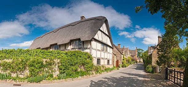 istock Thatched cottage idyllic country village 148957775